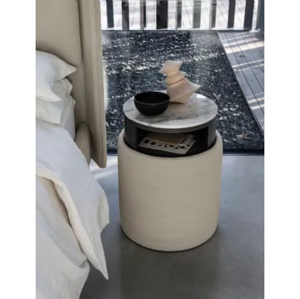 Pouf cilindrico multifunzione Ares in tessuto con cassetto push pull di Bolzan Letti