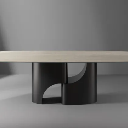 Tavolo Taijitu con piano in marmo e base in metallo di Bonaldo
